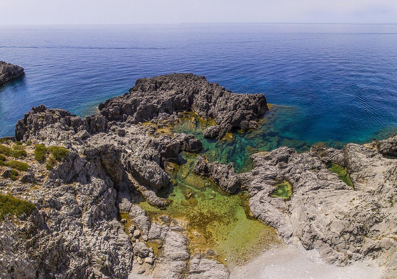 Cala Blanca Villaggio Alberghiero مارينا دي كاميروتا المظهر الخارجي الصورة